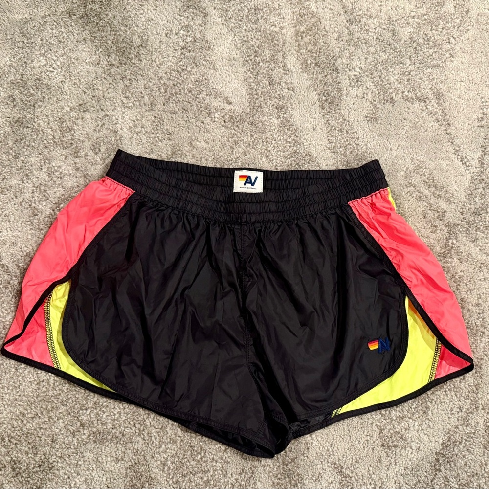 Aviator Nation nylon shorts
Adult size Large
Black, neon orange and neon yellow